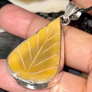 Carved Yellow Agate Leaf Pendant 2”